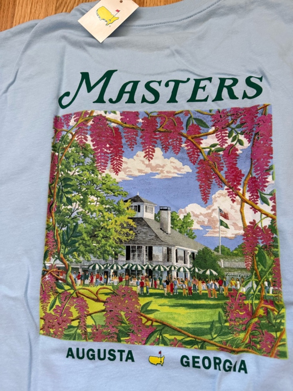 MASTERS BLUE SHORTSLEEVE TEE WITH PRINTED PHOTO OF CLUBHOUSE ON BACK SIZE LARGE